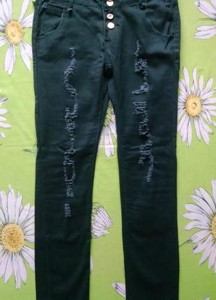 Темно-зеленые джинсы -рванки 44 р
