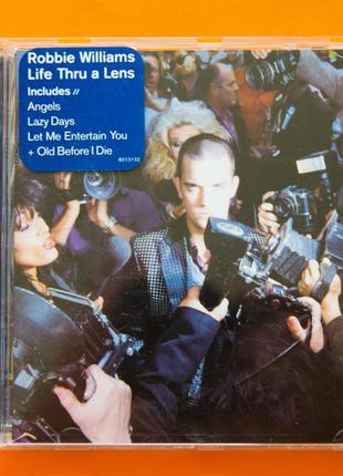Музыкальный CD диск. ROBBIE WILLIAMS - Life Thru a Lens 1997