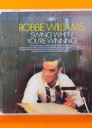 Музыкальный CD диск. ROBBIE WILLIAMS - Swing when youre winning