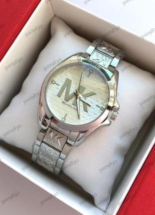 Стильні жіночі годинники сріблястого кольору, годинник