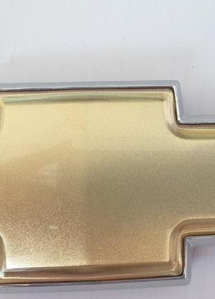 Эмблема крышки багажника крест с окантовкой Aveo T200