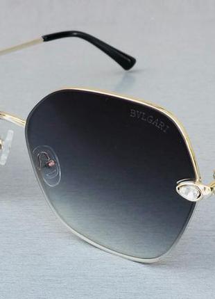 Bvlgari очки женские солнцезащитные серые в металлической золо...