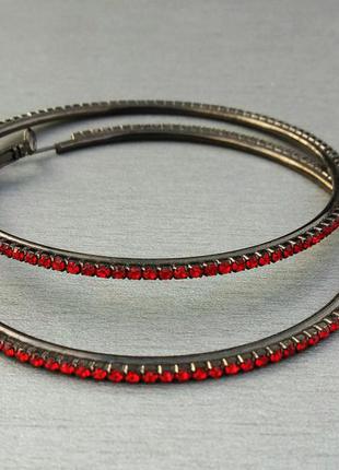 Сережки кільця з металу чорного кольору з червоними каменями