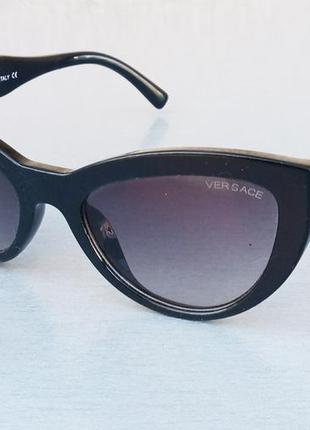 Versace стильные женские солнцезащитные очки черные с золотом